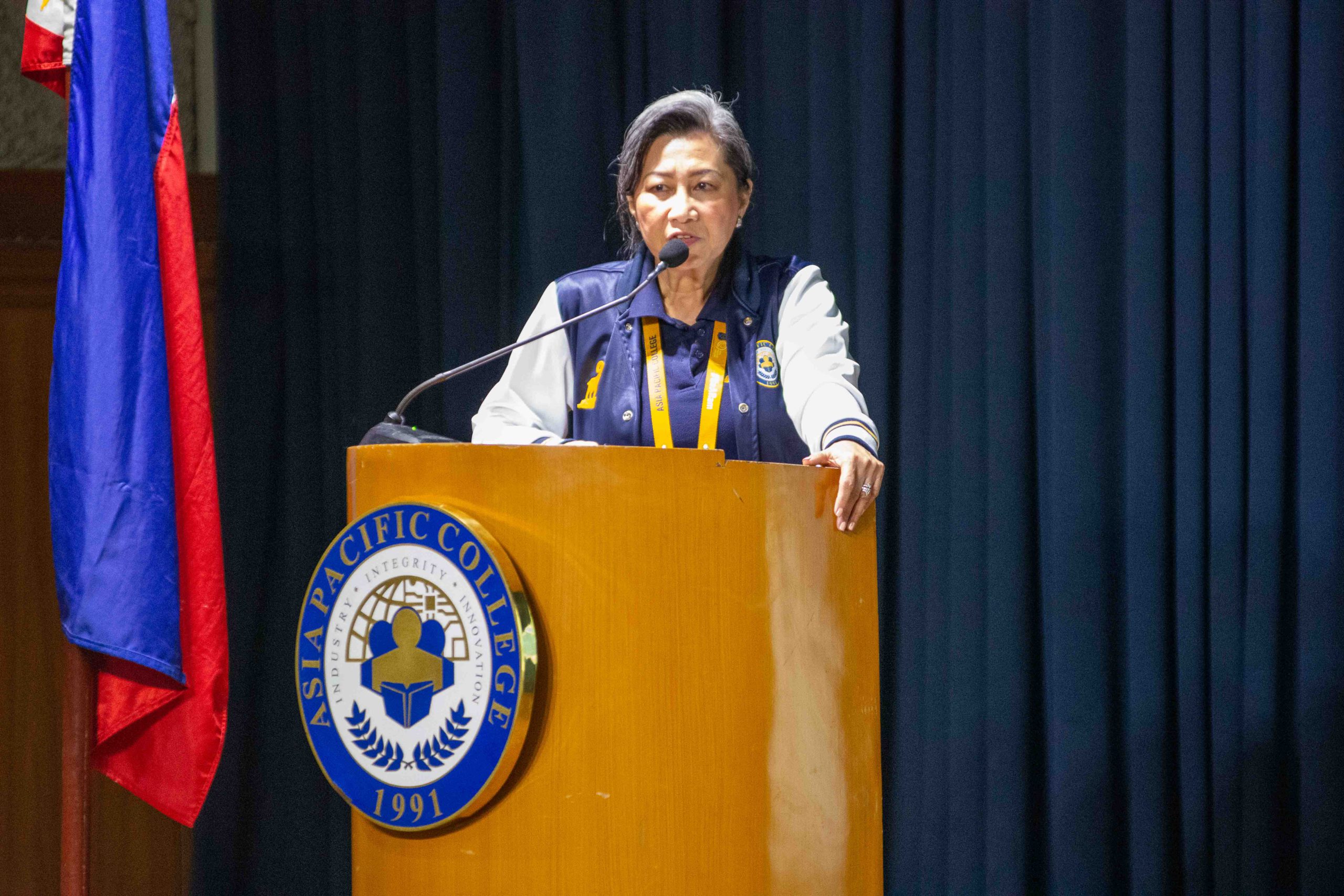 APC President Dr. Teresita Medado welcomes freshman students during the 2024 Student Orientation last August 2, 2024.